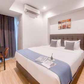 Bedroom 1 Restful and Good Deal 1BR at Branz BSD City Apartment By Travelio, BSD Hotels