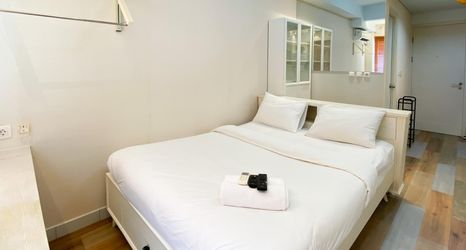 Bedroom 2 Nice and Comfort Studio Patraland Urbano Apartment By Travelio