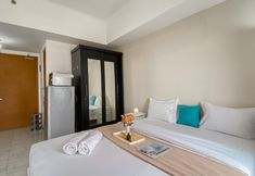Bedroom 2 Simply and Cozy Studio Apartment Margonda Residence 2 By Travelio