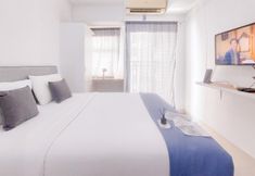Bedroom 2 Tidy and Restful Studio at Serpong Garden Apartment By Travelio