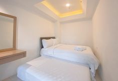 침실 2 Big and Homey 1BR Green Bay Pluit Apartment By Travelio