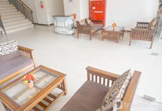 Lobby 7 The Cozy and Warm Abode 2BR Apartment at Tamansari Panoramic By Travelio