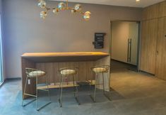 Lobby 3 Warm and Homey 1BR at Ciputra World 2 Apartment By Travelio