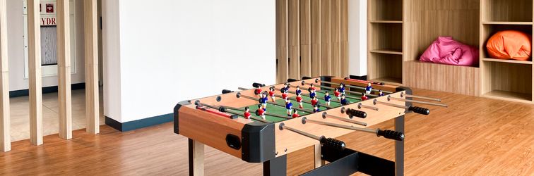 Lobby Homey and Elegant 1BR Apartment at Menara Jakarta Kemayoran By Travelio