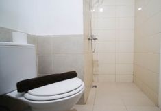 In-room Bathroom 5 Comfy and Tidy 1BR at Tamansari Prospero Sidoarjo Apartment By Travelio