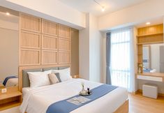 Bedroom 6 Modern and Comfy 1BR at Vasanta Innopark Apartment By Travelio