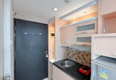 公共空間 6 Comfy and Serene Studio at Puri Mas Apartment By Travelio