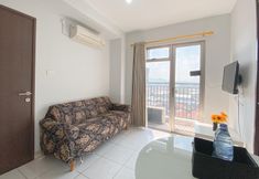 Common Space 4 The Elevated Abode 2BR Apartment at Mekarwangi Square Cibaduyut By Travelio