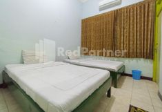 침실 2 Orange inn RedPartner Madiun