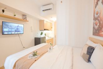 Bedroom 4 Compact and Simply Studio at Tokyo Riverside PIK 2 Apartment By Travelio