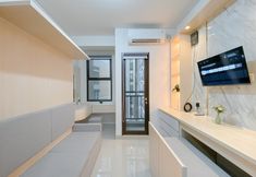 Common Space 2 Comfy and Elegant Studio at Transpark Cibubur Apartment By Travelio