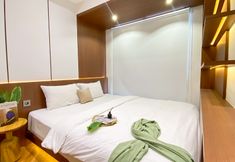 Bedroom 2 Combined and Spacious 2BR at Tokyo Riverside PIK 2 Apartment By Travelio