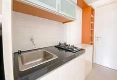 Common Space 7 The Modern Studio at Apartment Parahyangan Residence By Travelio