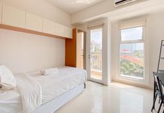 Bedroom 3 The Modern Studio at Apartment Parahyangan Residence By Travelio