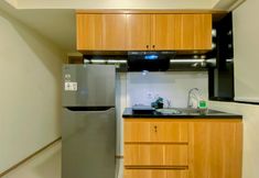 共用スペース 7 Homey and Simply 1BR with Extra Room at Meikarta Apartment By Travelio
