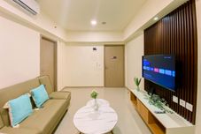 共用スペース Homey and Simply 1BR with Extra Room at Meikarta Apartment By Travelio