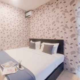 Bedroom 1 Warm and Spacious Combined Unit 2BR Apartment at Serpong Greenview By Travelio, Wangsa Serpong Hotels