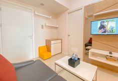 公共空间 4 Trendy Space 1BR at Parahyangan Residence Apartment By Travelio