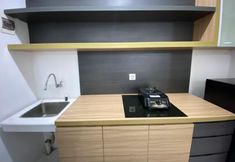 Common Space 6 Spacious and Stylish Studio at Apartment Jarrdin Cihampelas By Travelio