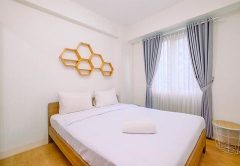 Exterior Restful and Homey 2BR Podomoro Golf View Apartment By Travelio