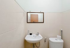 In-room Bathroom 7 2BR Homey and Best Deal at Bale Hinggil Apartment By Travelio