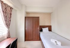 Bedroom 2 2BR Homey and Best Deal at Bale Hinggil Apartment By Travelio
