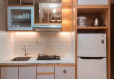 その他 4 Elegant and Cozy 2BR Apartment at Transpark Bintaro By Travelio