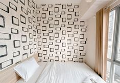 Bedroom 2 Minimalist 2BR at Tamansari Prospero Sidoarjo Apartment By Travelio