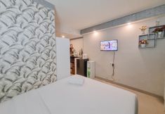 卧室 4 Studio Minimalist at Apartment Altuz Seturan Yogyakarta By Travelio