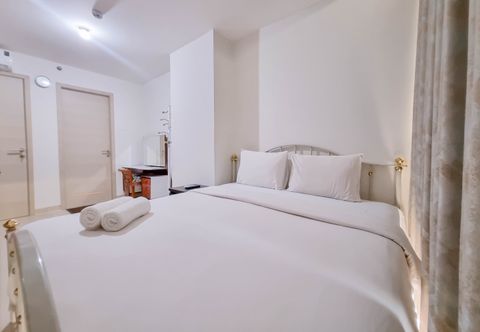 Bedroom Cozy and Enjoy Living 1BR Apartment at Mataram City By Travelio