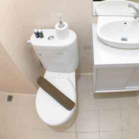 Bathroom 8 Minimalist and Cozy Studio Apartment Bale Hinggil By Travelio        , Sukolilo Apartments