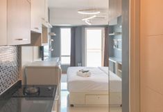 Common Space 5 Wonderful and Modern Studio Apartment at Orchard Supermall Mansion By Travelio