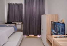 Bedroom 3 Cozy and Warm Studio Apartment at Serpong Garden By Travelio