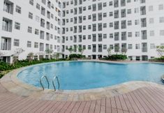 Exterior 4 Cozy and Nice Studio at Serpong Garden Apartment By Travelio