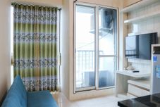 Common Space Functional 2BR Apartment at Tifolia By Travelio