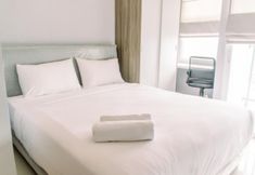 Bedroom 3 Nice and Fancy Studio at Apartment Serpong Garden By Travelio