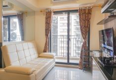 Common Space 4 Modern Style and Warm 2BR at Meikarta Apartment By Travelio