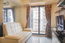 Common Space Modern Style and Warm 2BR at Meikarta Apartment By Travelio