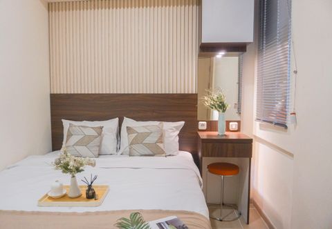 Bedroom Modern Style and Warm 2BR at Meikarta Apartment By Travelio