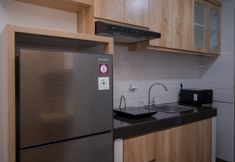 Common Space 6 Comfy Designed Studio at Apartment Anwa Residence By Travelio