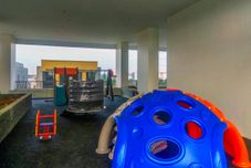 Lobby Modern Look and Cozy 1BR Apartment Vasanta Innopark By Travelio