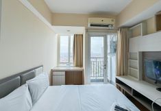 Bedroom 2 Good Choice and Restful Studio at Tamansari Papilio Apartment By Travelio