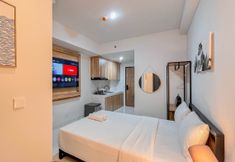 Bedroom 2 The Good Estate Studio Apartment at Delft Ciputra Makassar By Travelio