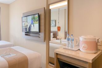 Bedroom 4 Studio Comfy (No Kitchen) Apartment at Grand Palace Kemayoran By Travelio