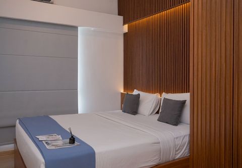 Bedroom Homey and Good Choice 2BR Apartment at Sky House BSD By Travelio
