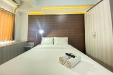 Bedroom Cozy Stay and Warm Studio Room at Patraland Urbano Apartment By Travelio