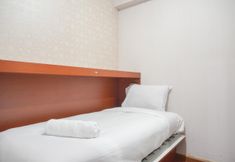 Bedroom 4 Apartment 2BR Green Pramuka City near Shopping Center By Travelio
