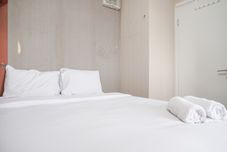 Bedroom Apartment 2BR Green Pramuka City near Shopping Center By Travelio