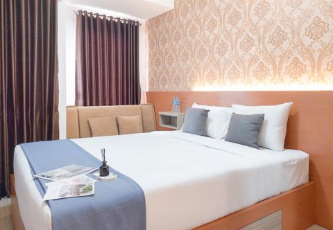 침실 Enjoy Living Studio at Apartment Urban Heights Residence By Travelio
