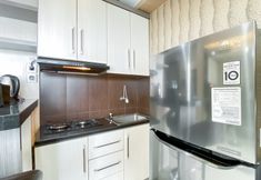 Common Space 6 Relaxing and Best Price 1BR at Green Pramuka City Apartment By Travelio